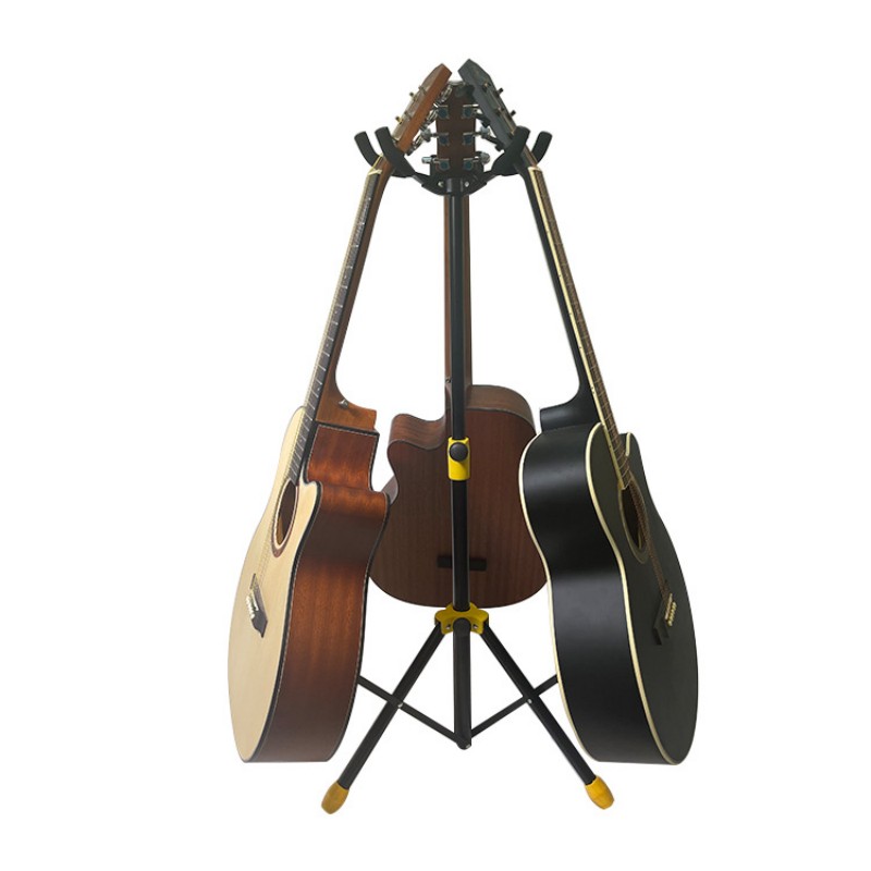utilizzo del supporto per chitarra a terra, treppiede pieghevole e regolabile per 3 chitarre e/o 3 bassi elettrici