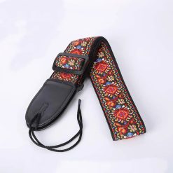 Sangle en tissu avec un motif floral brodé rouge