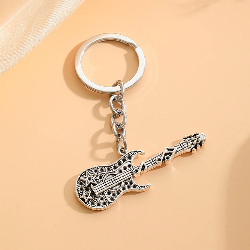 Modèle d'Amulette porte-clé guitare vintage