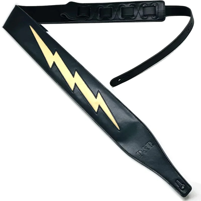 Cinghia per chitarra in pelle con iconico modello di fulmine giallo su sfondo nero