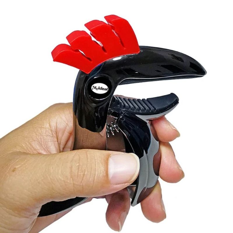 Prise en main du Détails Capodastre en métal en alliage de zinc en forme de Toucan - 2 couleurs au Choix !