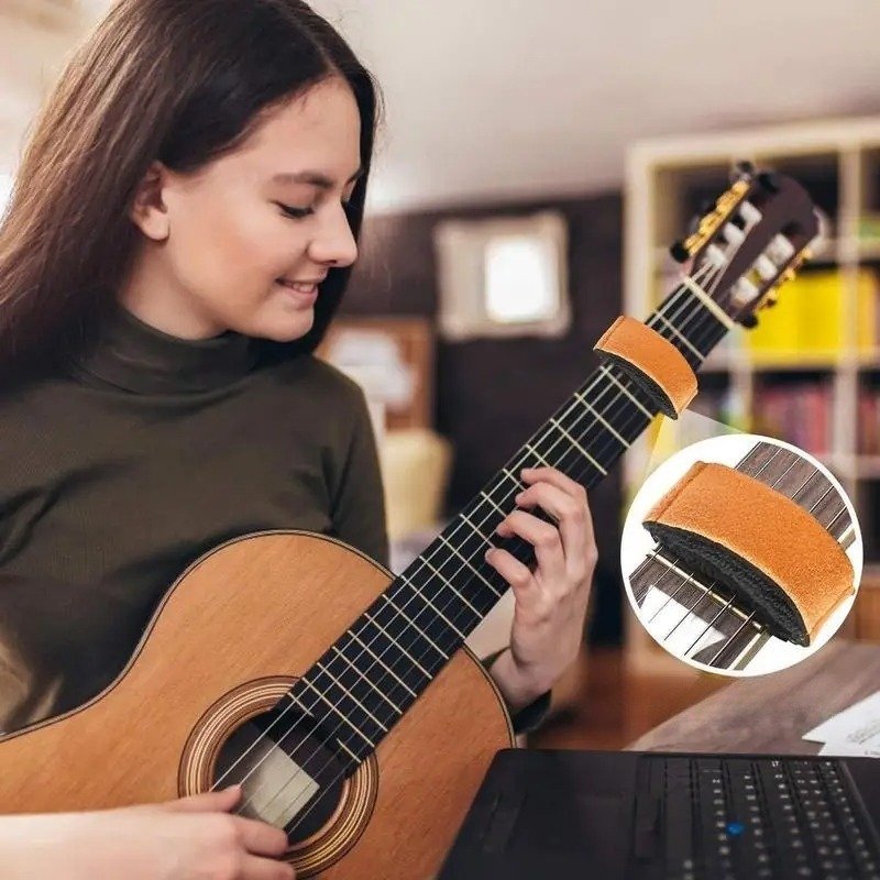 Ammortizzatore silenzioso per corde di chitarra di colore marrone