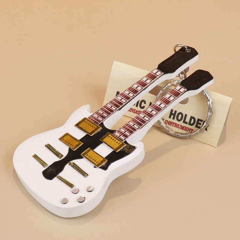 Portachiavi a forma di chitarra elettrica a doppio manico di colore bianco