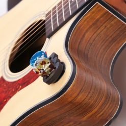 Supporto per plettri da chitarra con ventosa