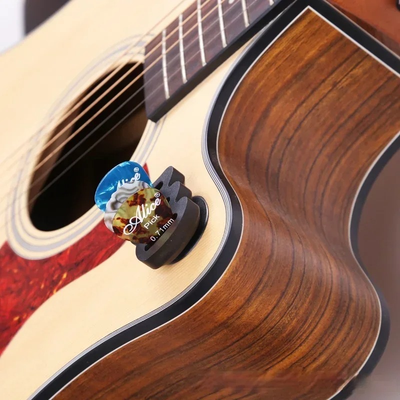 Supporto per plettri da chitarra con ventosa