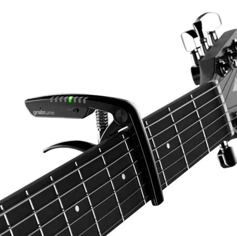 Magnifico Capotasto per Chitarra Modello Grabtune Pro 2-in-1 Accordatore Intelligente LED Ricaricabile