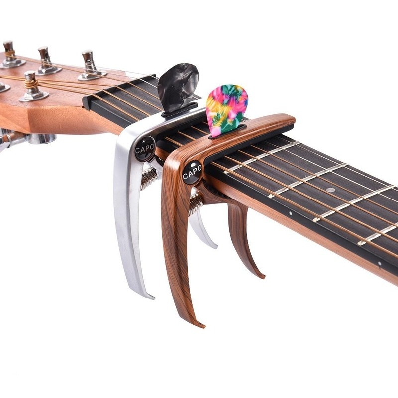 Capodastre pour guitares avec support pour médiators