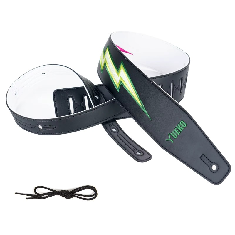 Sangle de guitare Double Lightning côté face noire, éclair vert brodé en relief, revers blanc visible